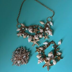 Matching shell necklace, bracelet and hair comb. NWOT